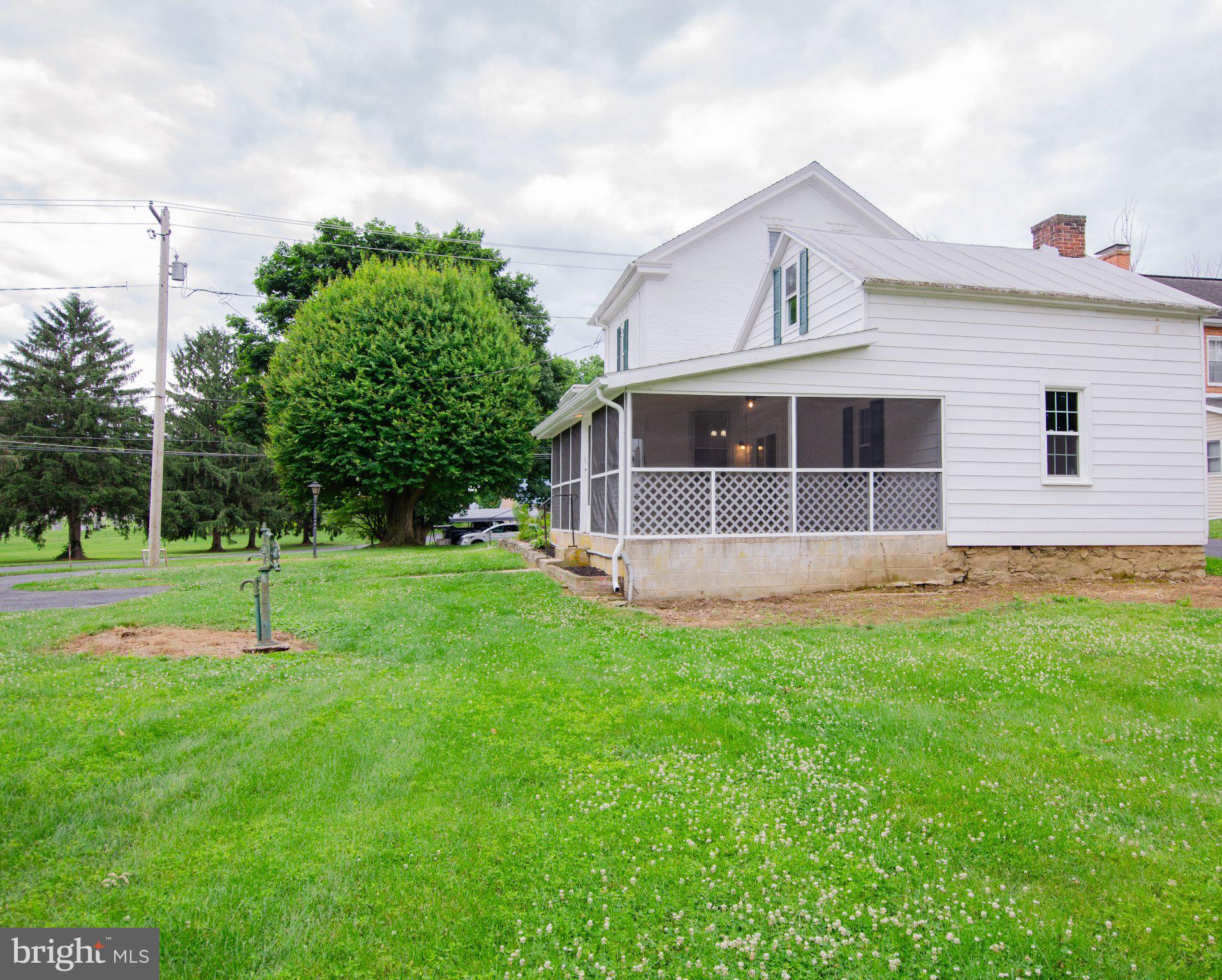 2615 Walnut Bottom Road Carlisle, PA 17015 - Photo 6 of 38 Charming home with lush green surroundings.