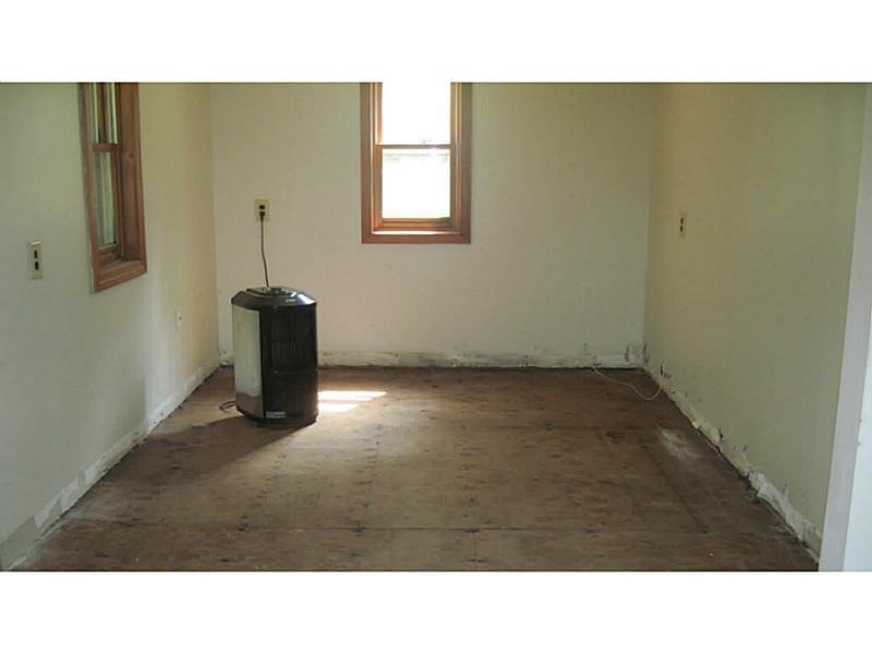 60 Mountain View Road Casco, ME 04015 - Photo 21 of 28 Den. Needs new flooring.