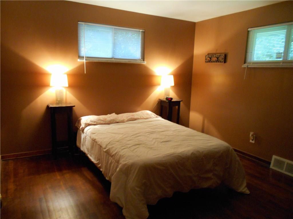 652 Filmore Road Pittsburgh, PA 15221 - Photo 14 of 24 2nd bedroom in the rear of the house has beautiful hardwood floors.