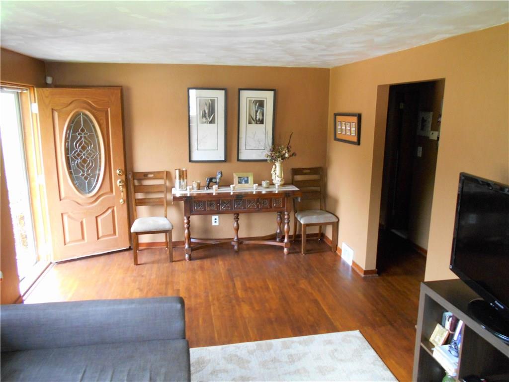 652 Filmore Road Pittsburgh, PA 15221 - Photo 7 of 24 There's room in this space for a small table and chairs. Take notice of the decorative front door.
