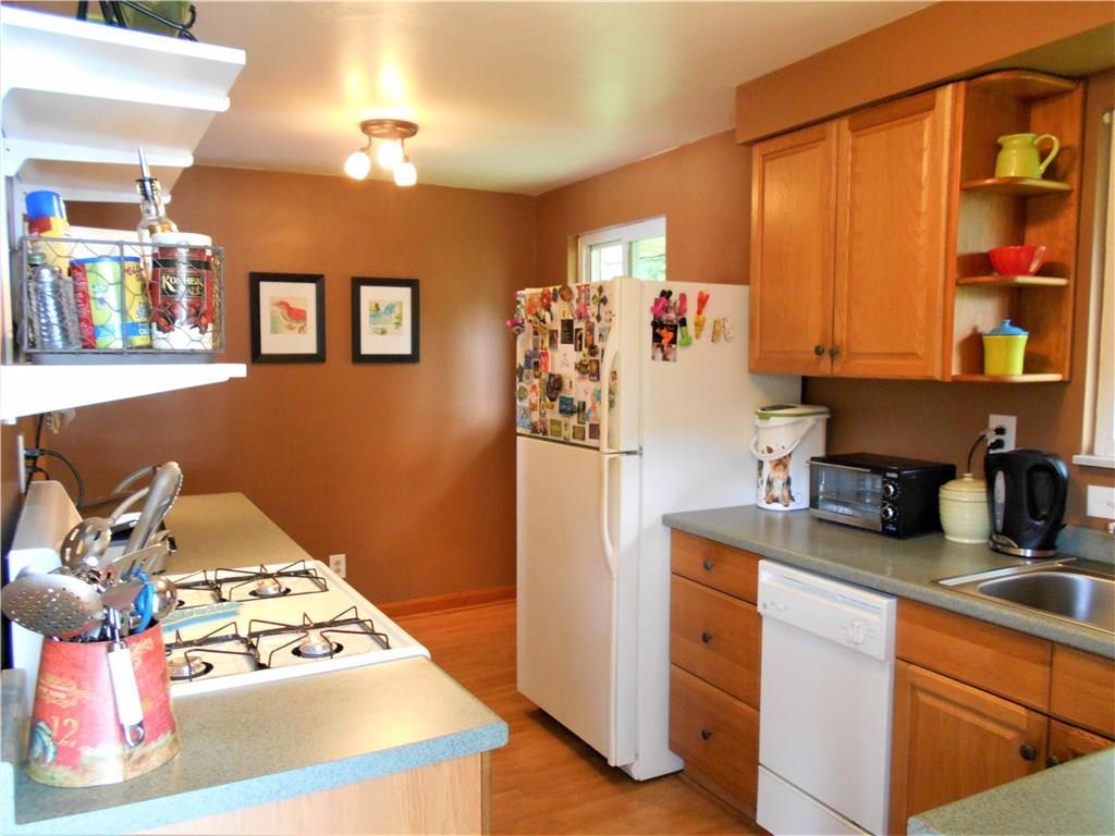 652 Filmore Road Pittsburgh, PA 15221 - Photo 10 of 24 Plenty of counter space in this charming kitchen.