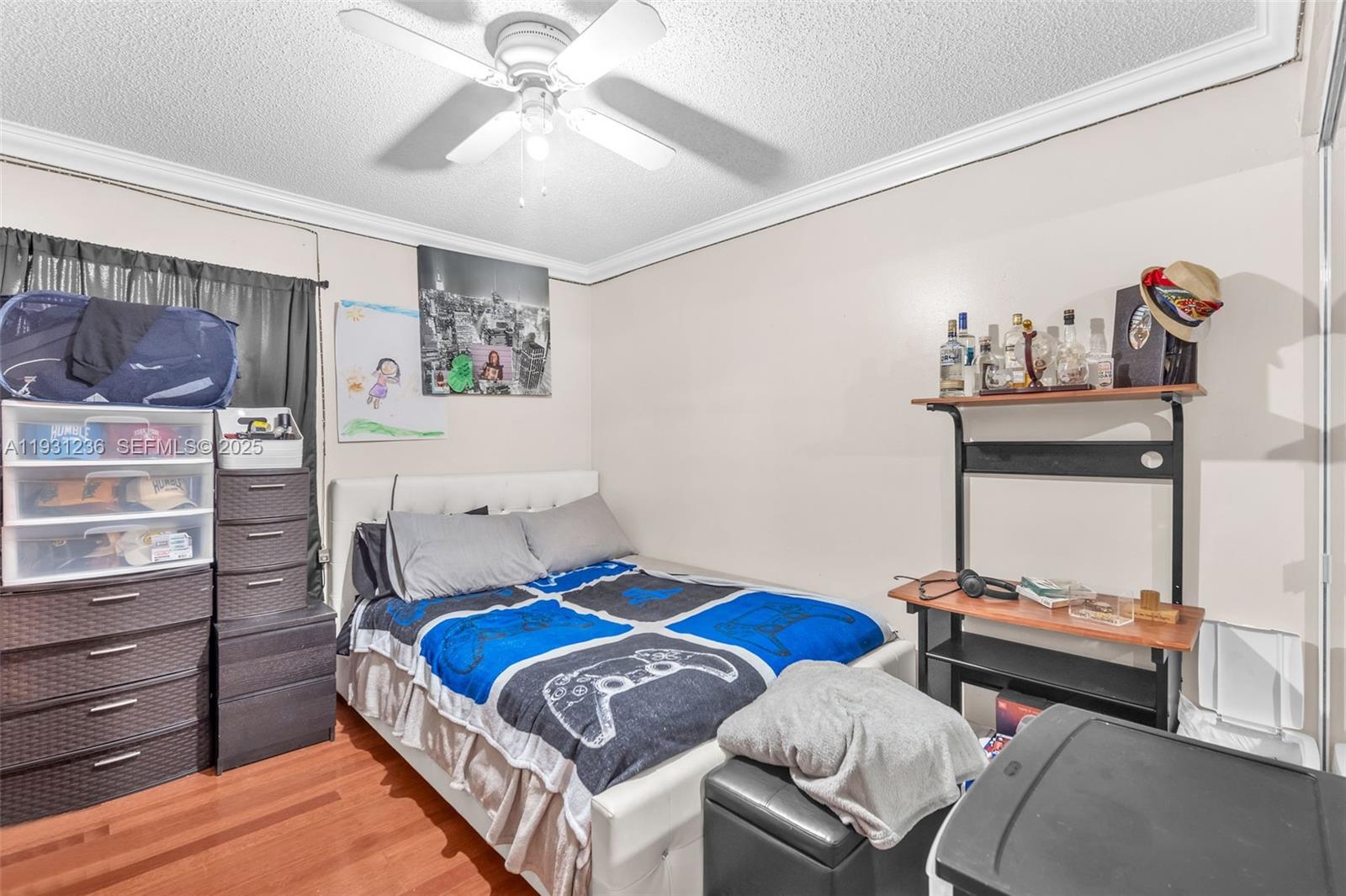 3370 Beau Rivage Drive, Unit 3N Pompano Beach, FL 33064 - Photo 26 of 38 a bedroom with a bed and a window