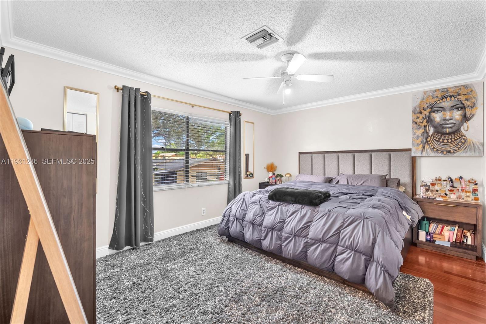 3370 Beau Rivage Drive, Unit 3N Pompano Beach, FL 33064 - Photo 27 of 38 a bedroom with a bed and a large window