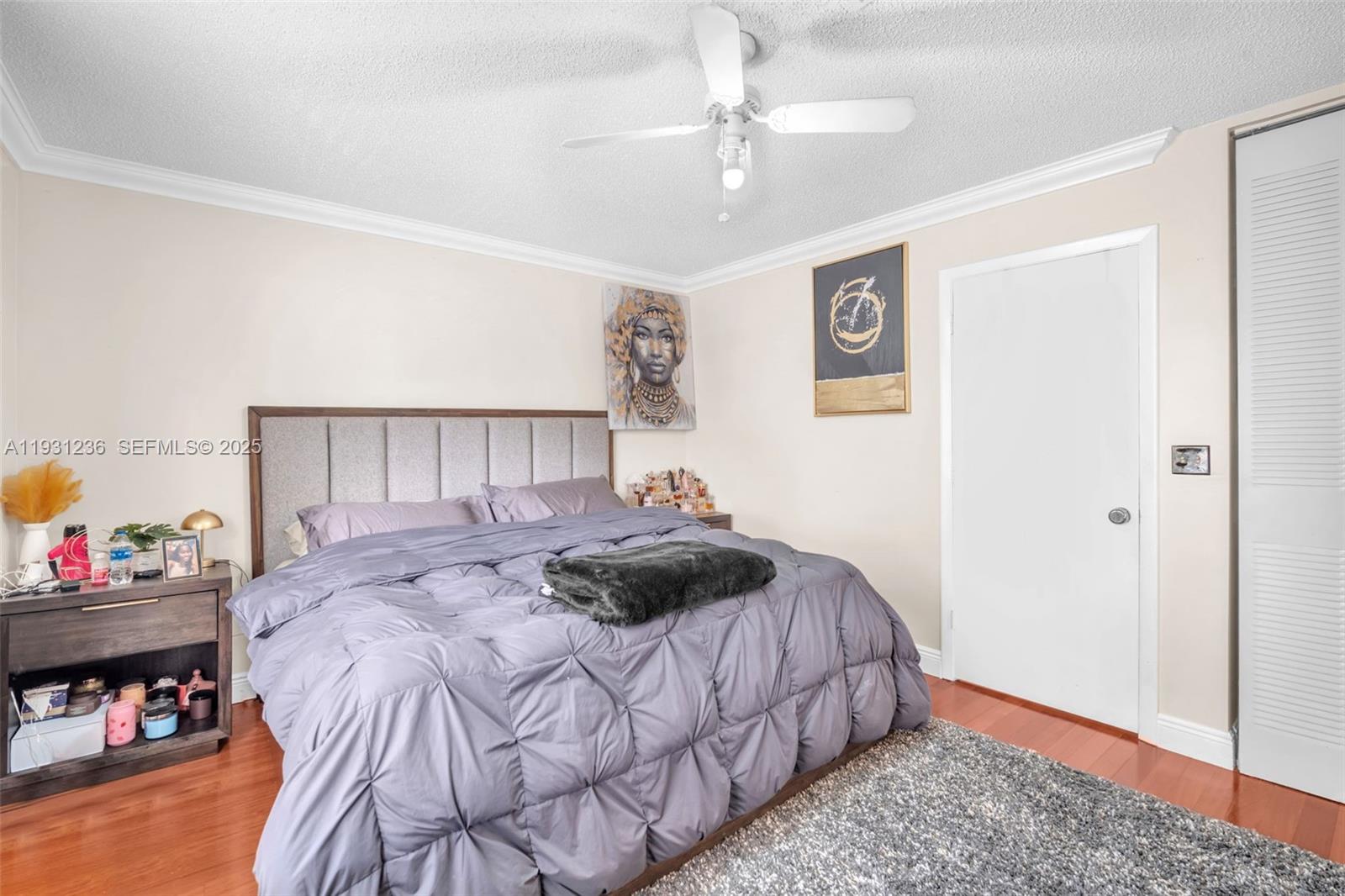 3370 Beau Rivage Drive, Unit 3N Pompano Beach, FL 33064 - Photo 28 of 38 a bedroom with a bed and a window