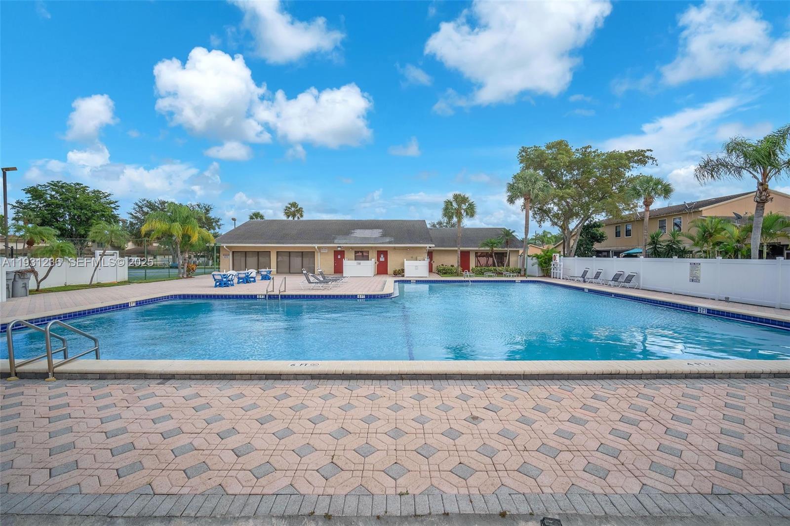 3370 Beau Rivage Drive, Unit 3N Pompano Beach, FL 33064 - Photo 35 of 38 a view of a house with a yard