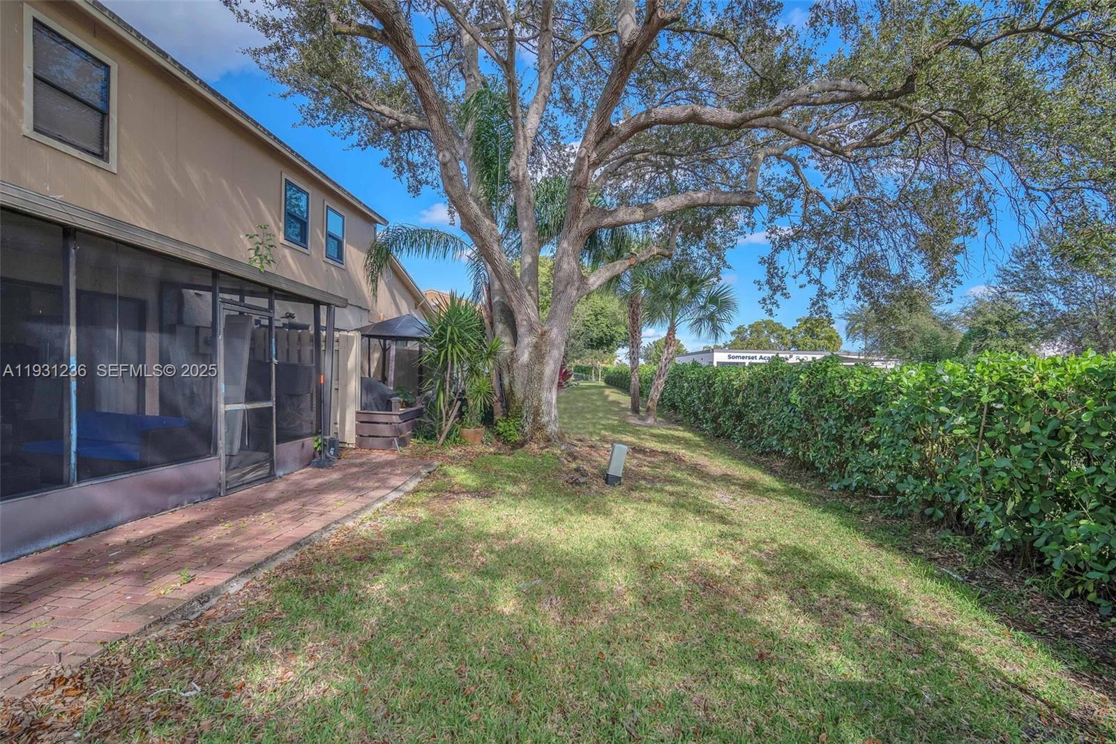 3370 Beau Rivage Drive, Unit 3N Pompano Beach, FL 33064 - Photo 5 of 38 a view of backyard with green space