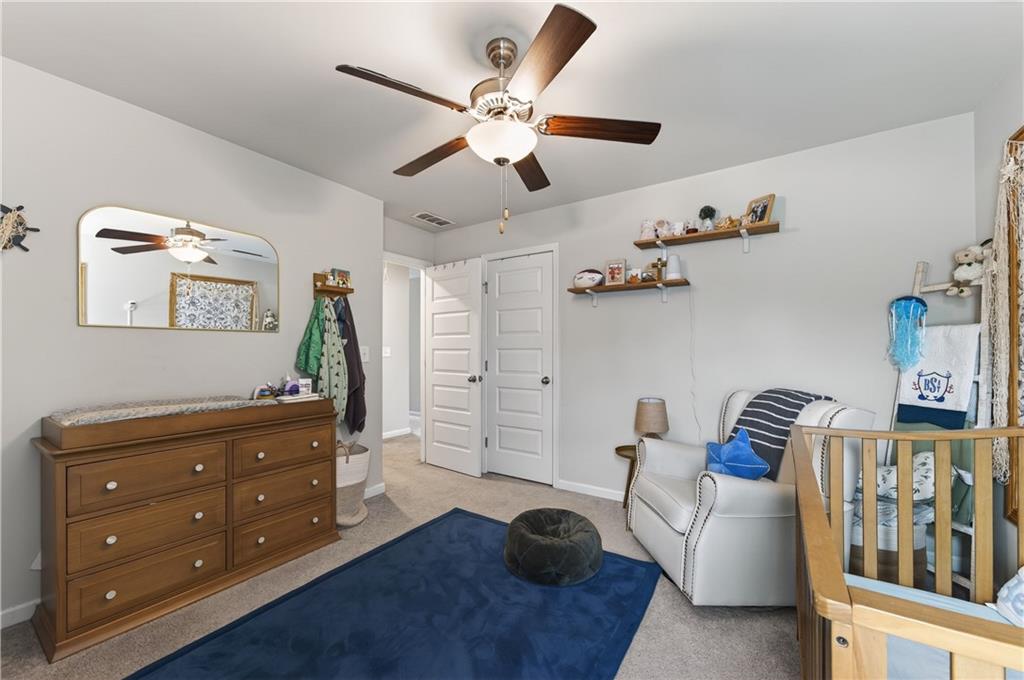 266 Shoals Bridge Road Acworth, GA 30102 - Photo 29 of 43 a bedroom with furniture and a window
