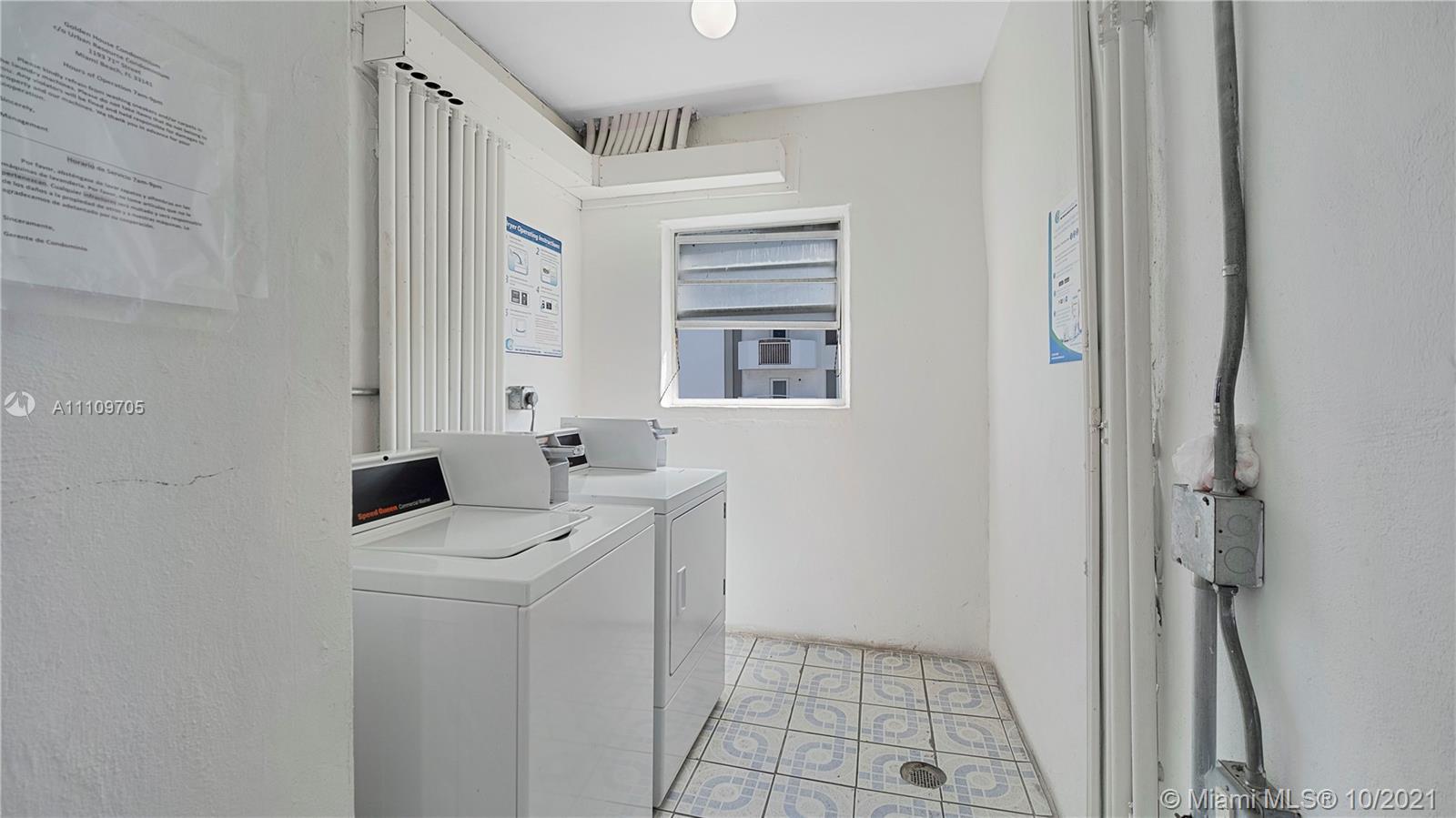 1340 Lincoln Road, Unit 806 Miami Beach, FL 33139 - Photo 25 of 48 a utility room with closet dryer and washer