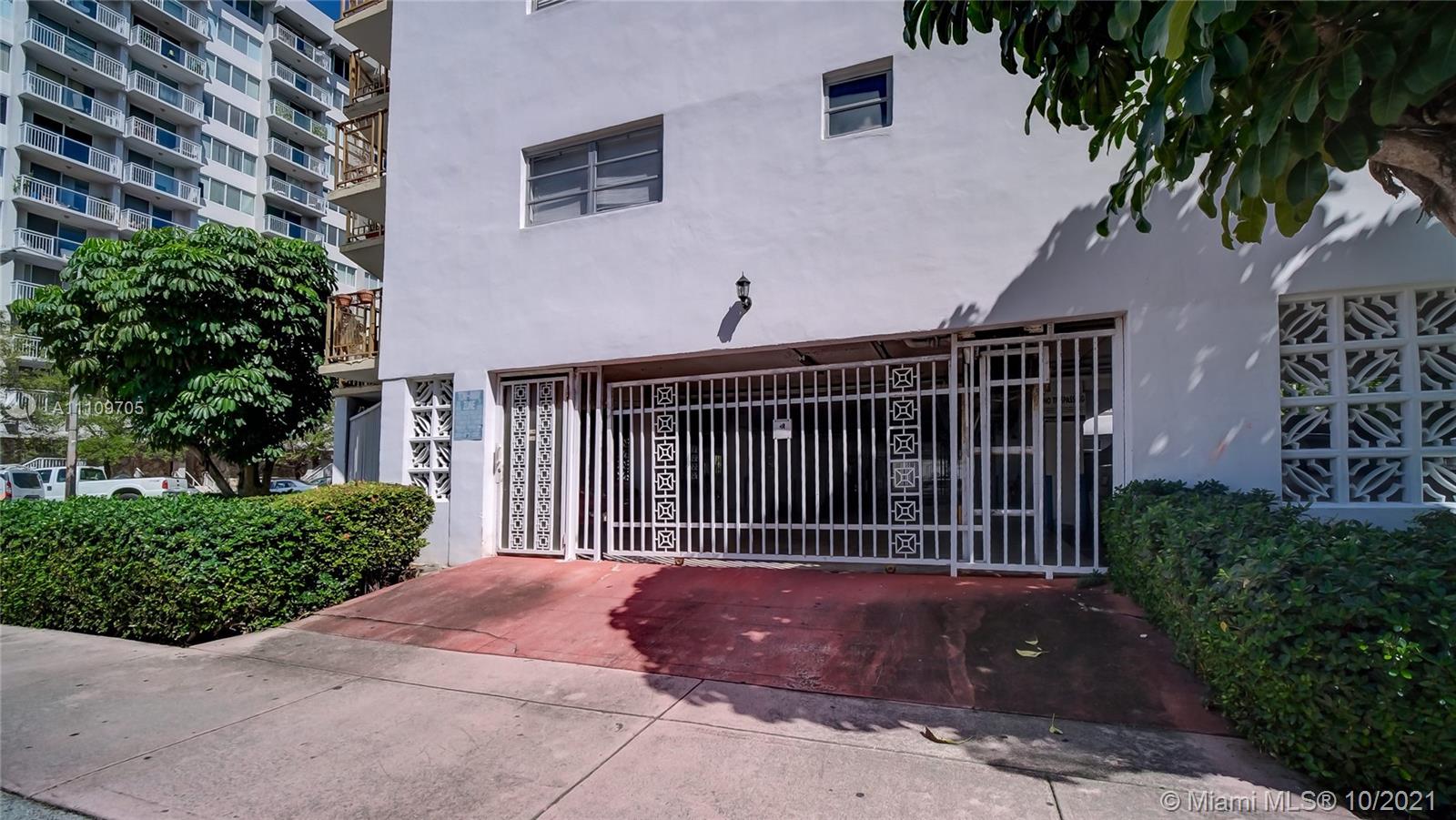 1340 Lincoln Road, Unit 806 Miami Beach, FL 33139 - Photo 40 of 48 a front view of a house with a garden