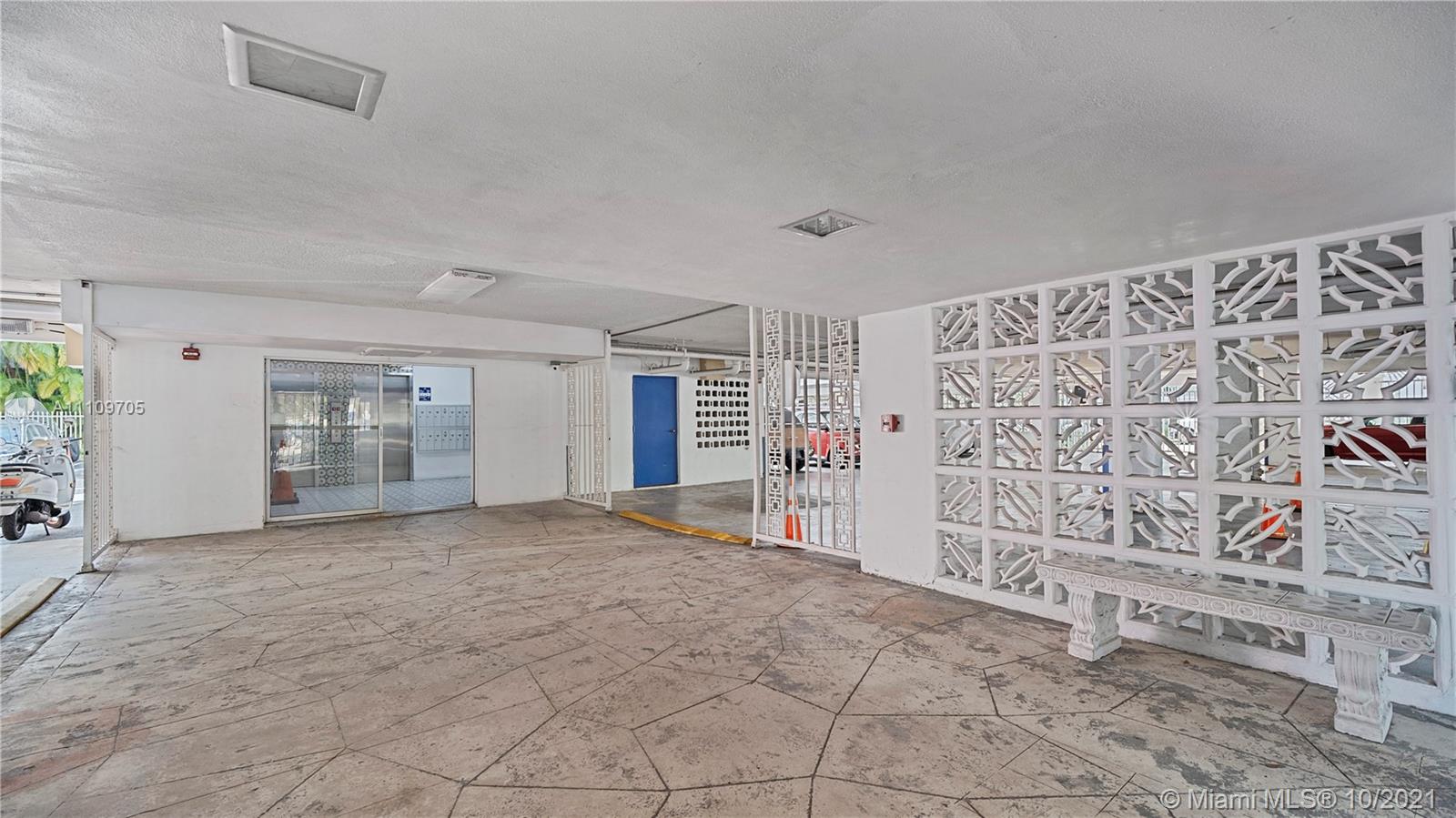 1340 Lincoln Road, Unit 806 Miami Beach, FL 33139 - Photo 44 of 48 a view of an empty room with windows