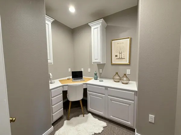 a view of a bathroom with a sink a toilet and a mirror
