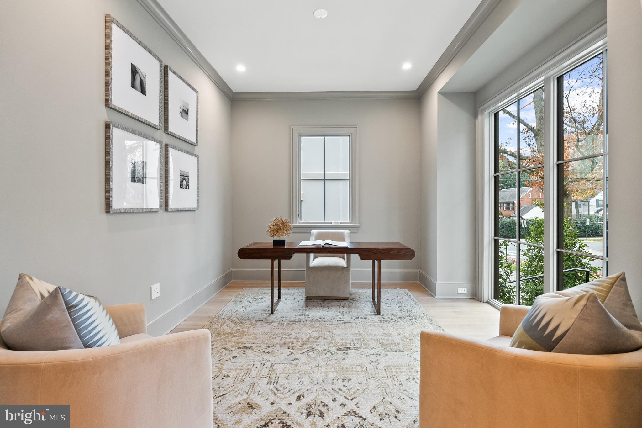 4905 Van Ness Street Northwest Washington, DC 20016 - Photo 12 of 27 a living room with furniture and a window