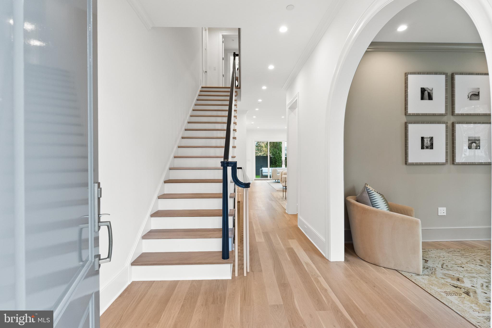 4905 Van Ness Street Northwest Washington, DC 20016 - Photo 2 of 27 a view of a hallway with wooden floor and entryway