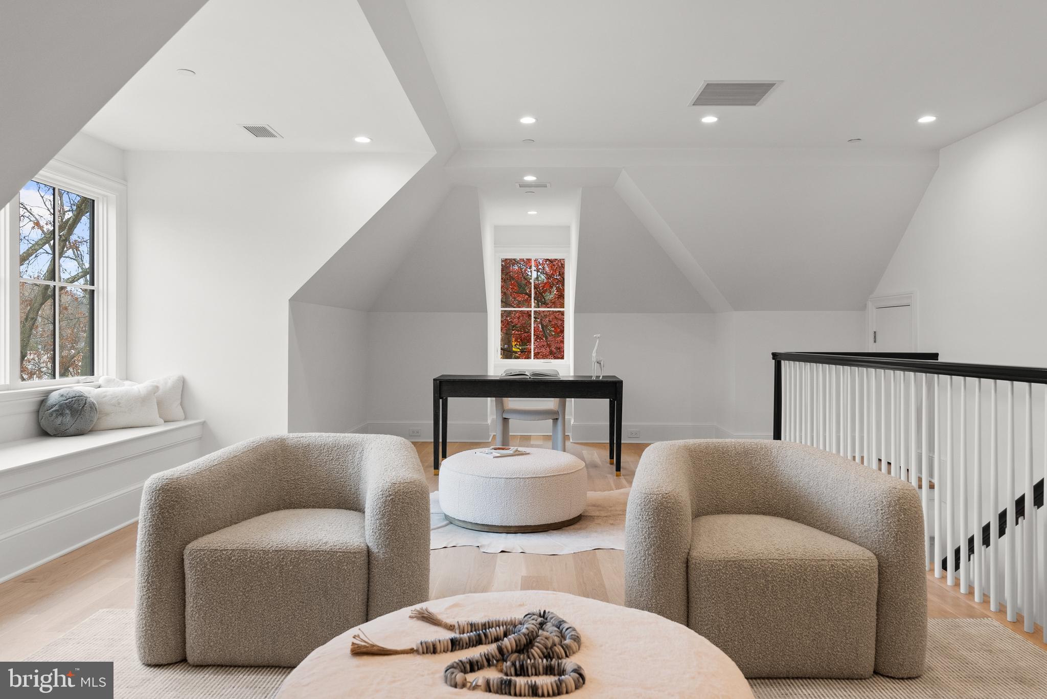 4905 Van Ness Street Northwest Washington, DC 20016 - Photo 23 of 27 a living room with furniture and a large window