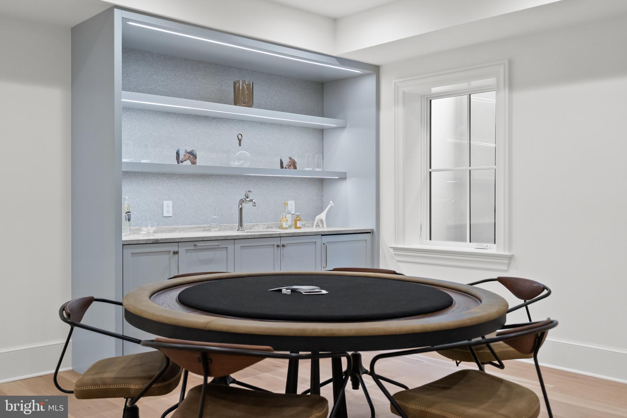 4905 Van Ness Street Northwest Washington, DC 20016 - Photo 26 of 27 a view of a dining room with furniture and a window