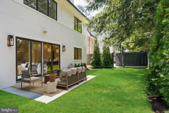 a living room with furniture and garden
