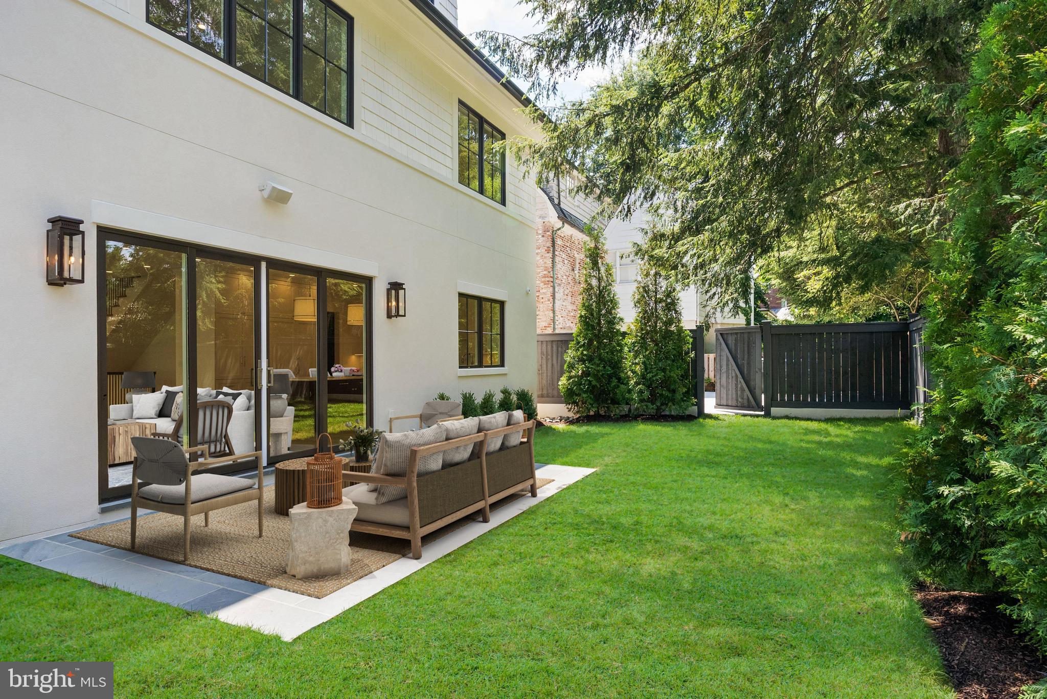 4905 Van Ness Street Northwest Washington, DC 20016 - Photo 8 of 27 a living room with furniture and garden