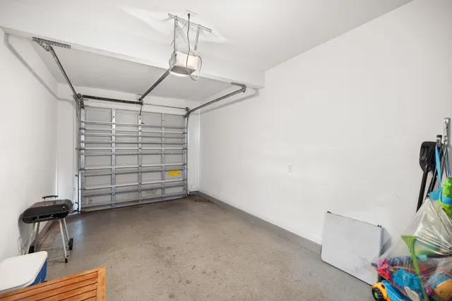 a front view of residential houses with yard