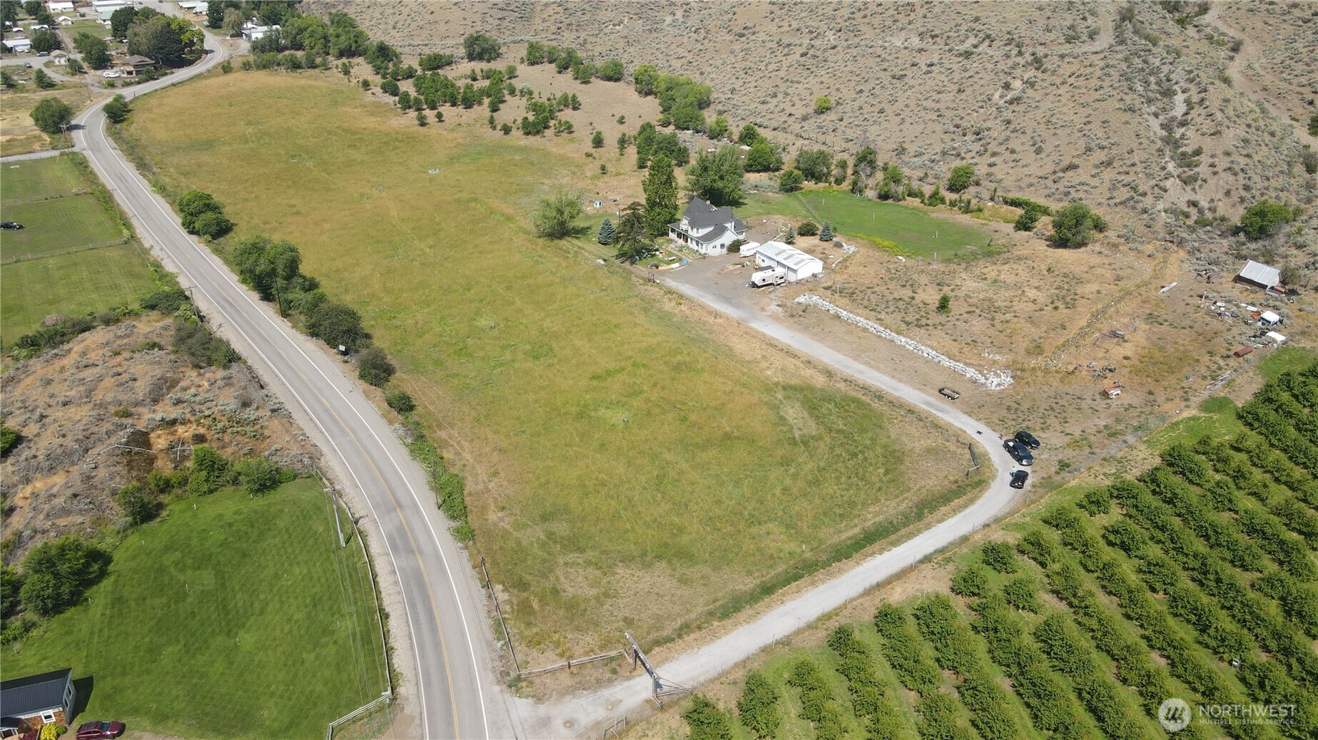 a view of a swimming pool with a yard