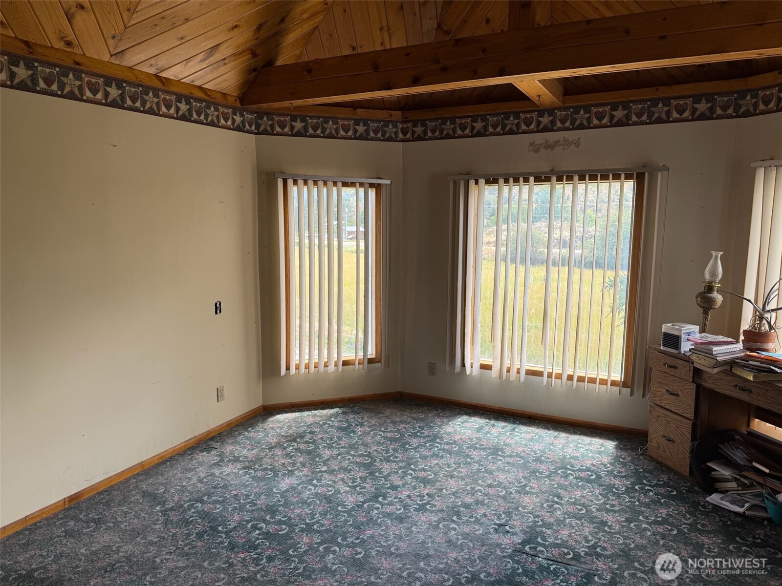 1112 Loomis-Oroville Road Loomis, WA 98827 - Photo 12 of 40 a view of an empty room with a window