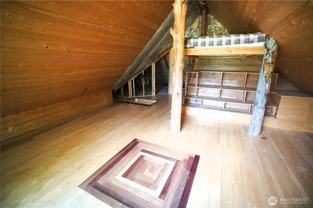 a view of staircase with a rug