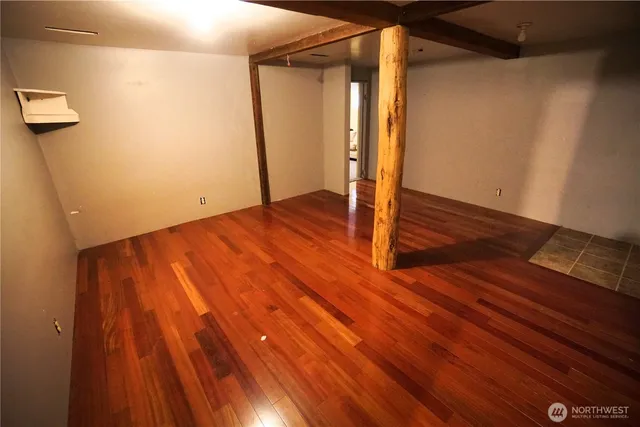 a view of a room with a flat screen tv