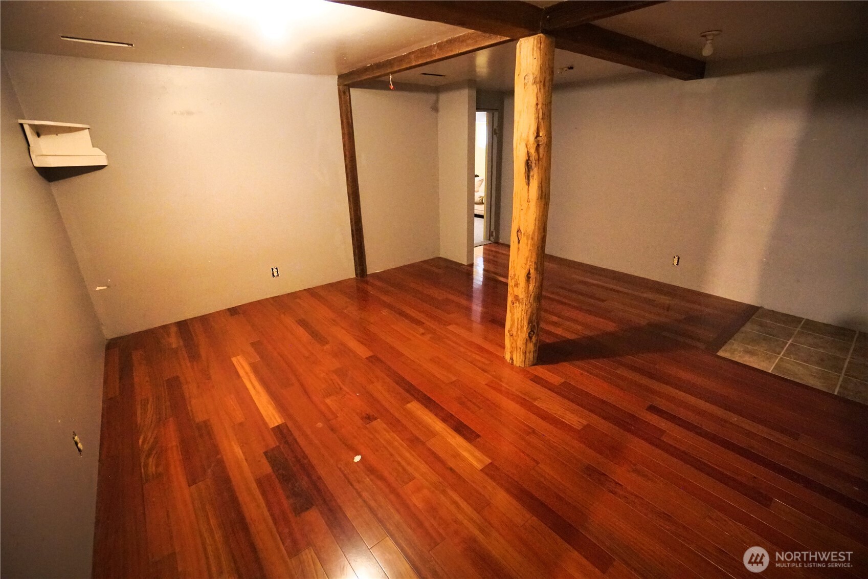 1112 Loomis-Oroville Road Loomis, WA 98827 - Photo 16 of 40 a view of empty room with wooden floor