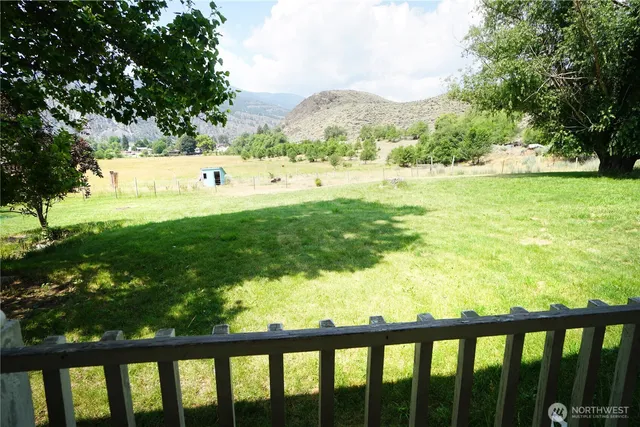 a view of a garden with a bench