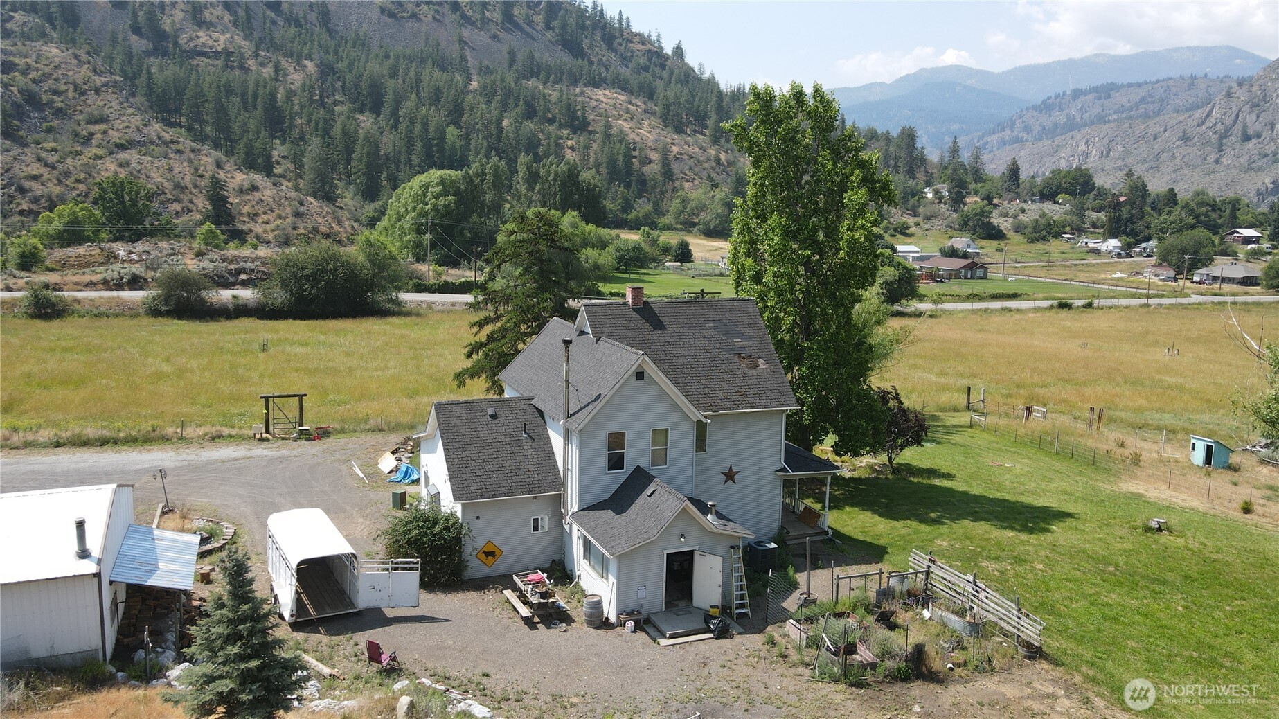 1112 Loomis-Oroville Road Loomis, WA 98827 - Photo 27 of 40 an aerial view of a house with a ocean view