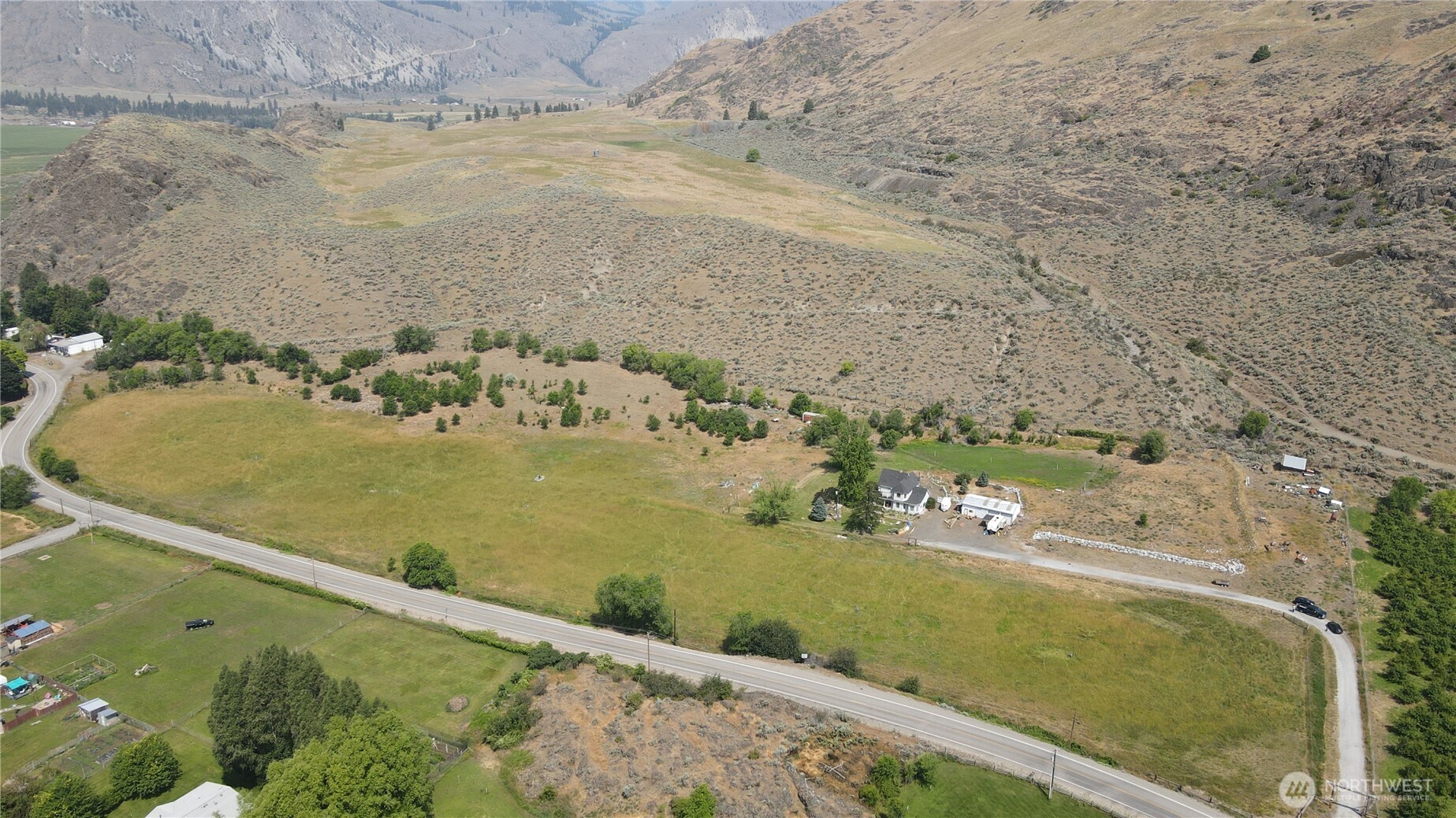 1112 Loomis-Oroville Road Loomis, WA 98827 - Photo 37 of 40 an aerial view of a residential houses with outdoor space