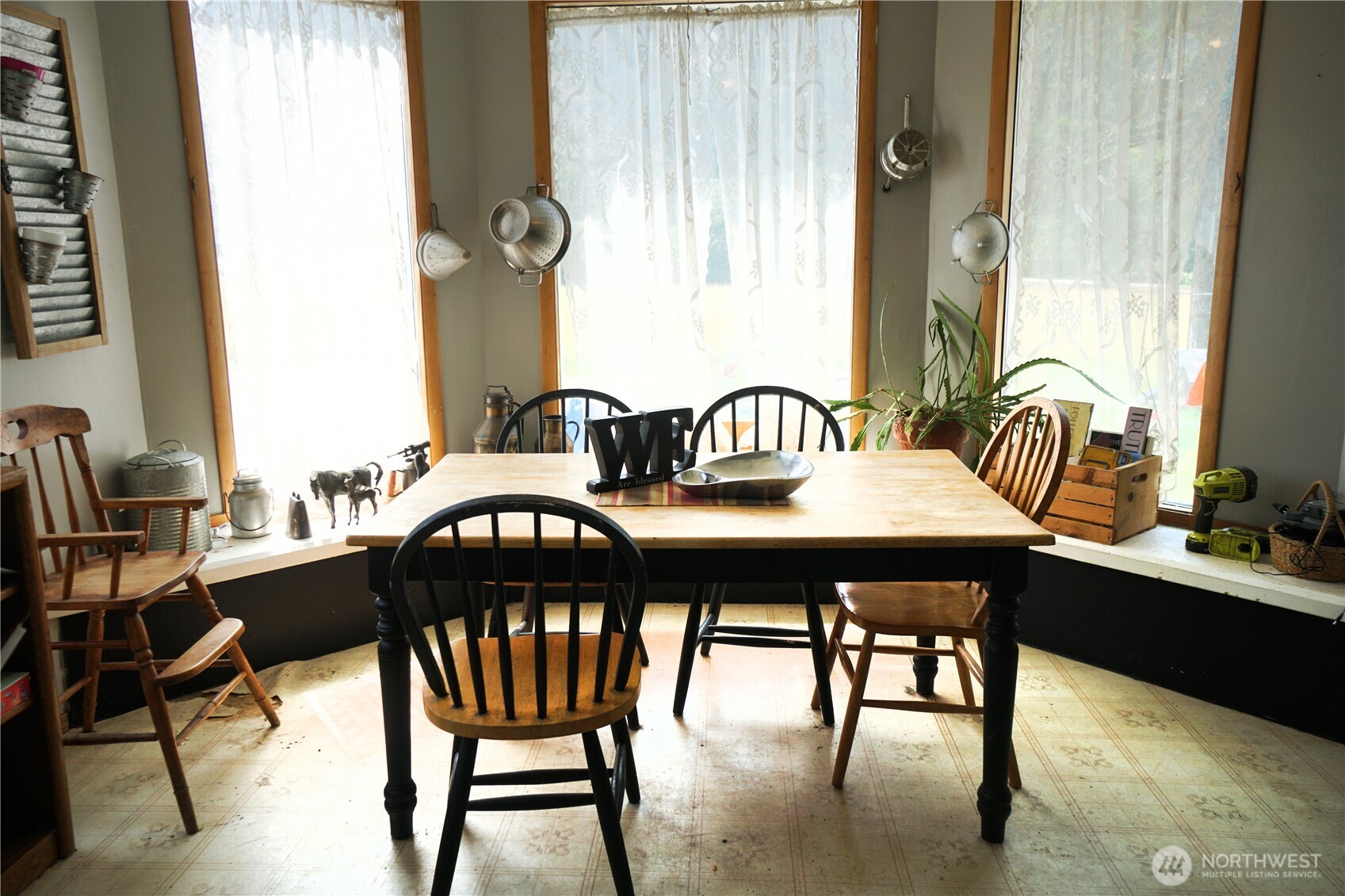 1112 Loomis-Oroville Road Loomis, WA 98827 - Photo 6 of 40 a view of a dining room with furniture and window