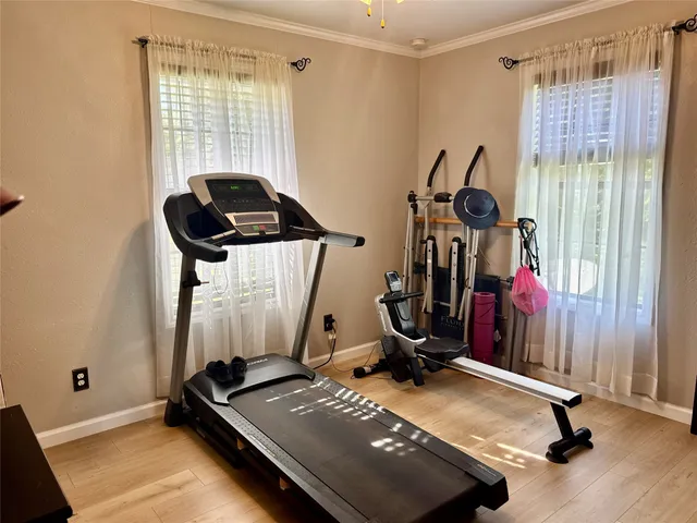 a view of a balcony with wooden floor