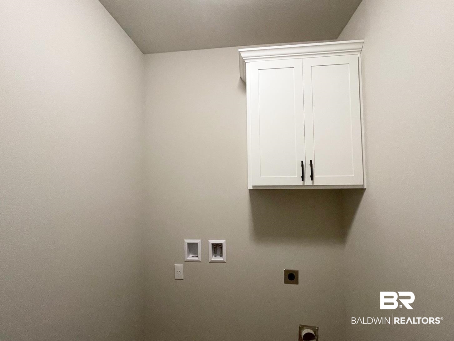 1392 Fenton Circle Foley, AL 36535 - Photo 13 of 17 Washroom featuring electric dryer hookup, cabinets, and hookup for a washing machine