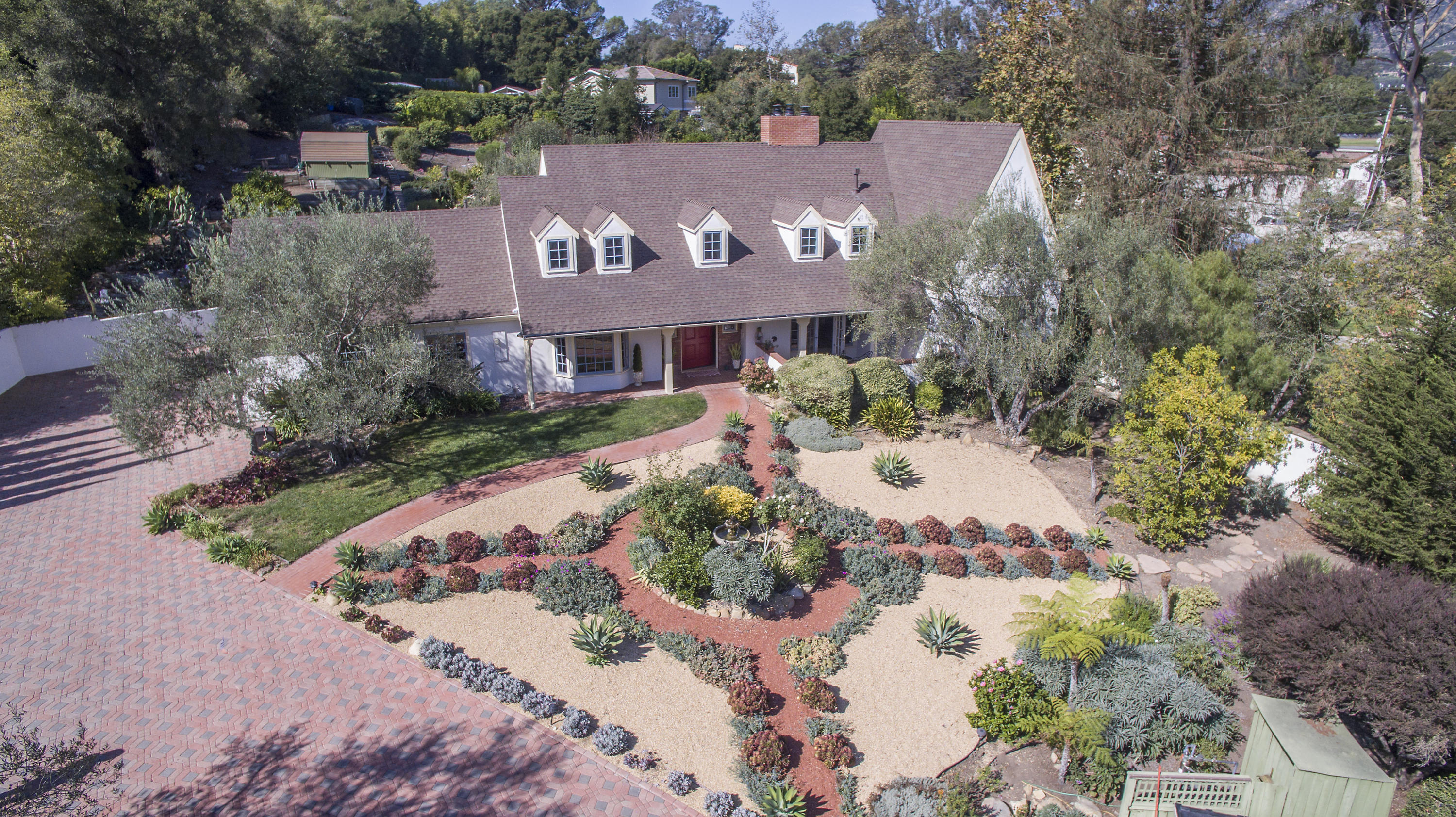 3165 Eucalyptus Hill Road Santa Barbara, CA 93108 - Photo 1 of 21 a view of a house with a yard