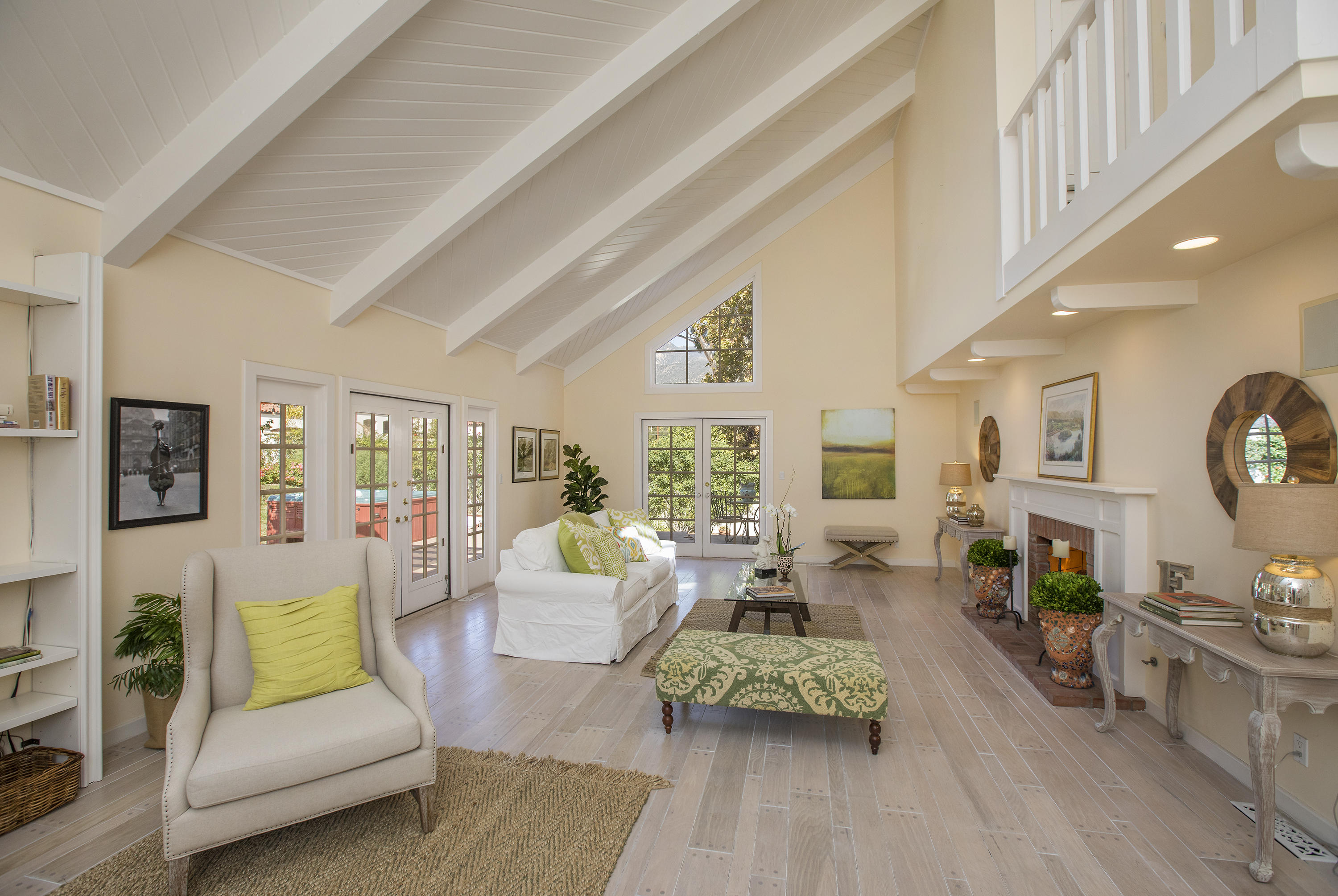 3165 Eucalyptus Hill Road Santa Barbara, CA 93108 - Photo 3 of 21 a living room with furniture fireplace and a large window