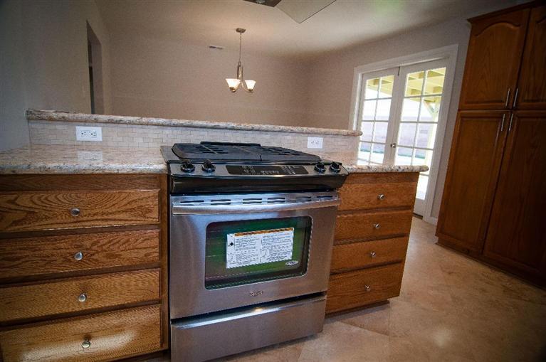 30 Rio Via Oak View, CA 93022 - Photo 10 of 23 a stove top oven sitting inside of a kitchen