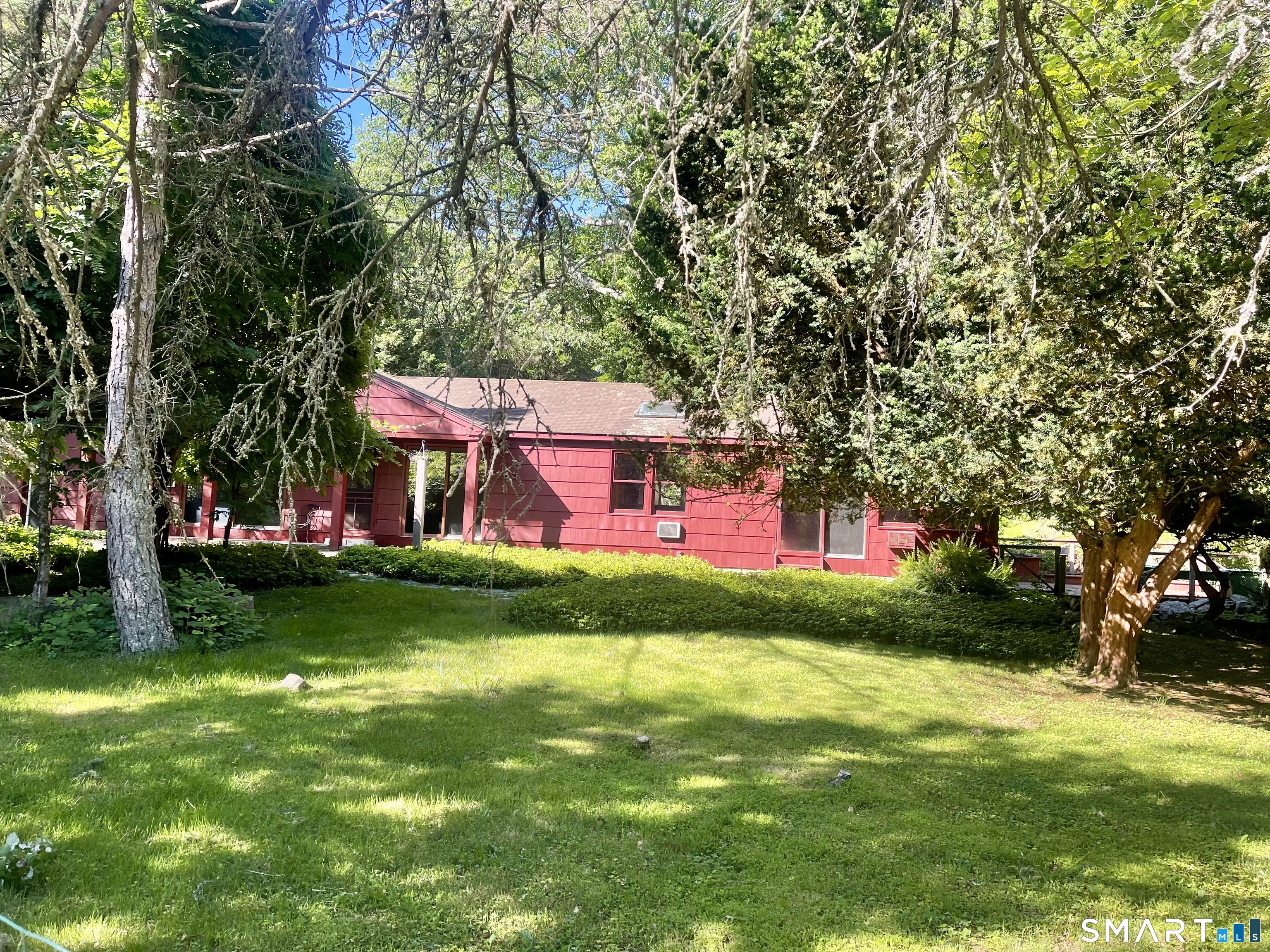 11 Tubbs Spring Drive Weston, CT 06883 - Photo 1 of 36 Rambling rustic ranch tucked back on 2 acres on a quiet cul-de-sac