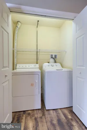 a utility room with a washer dryer