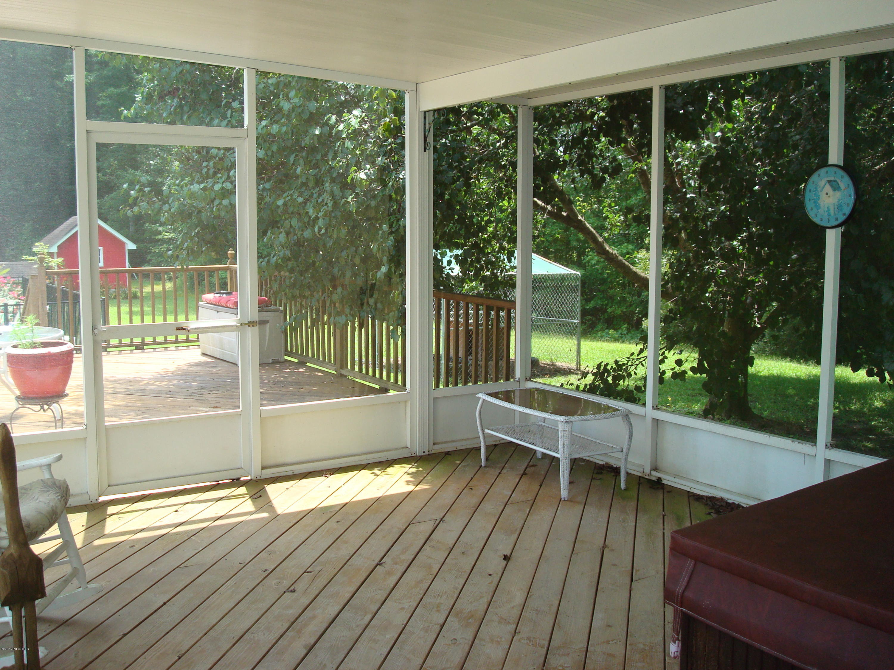 209 Boyd Swamp Road Pinetown, NC 27865 - Photo 4 of 19 Screened in Porch with Hot Tub