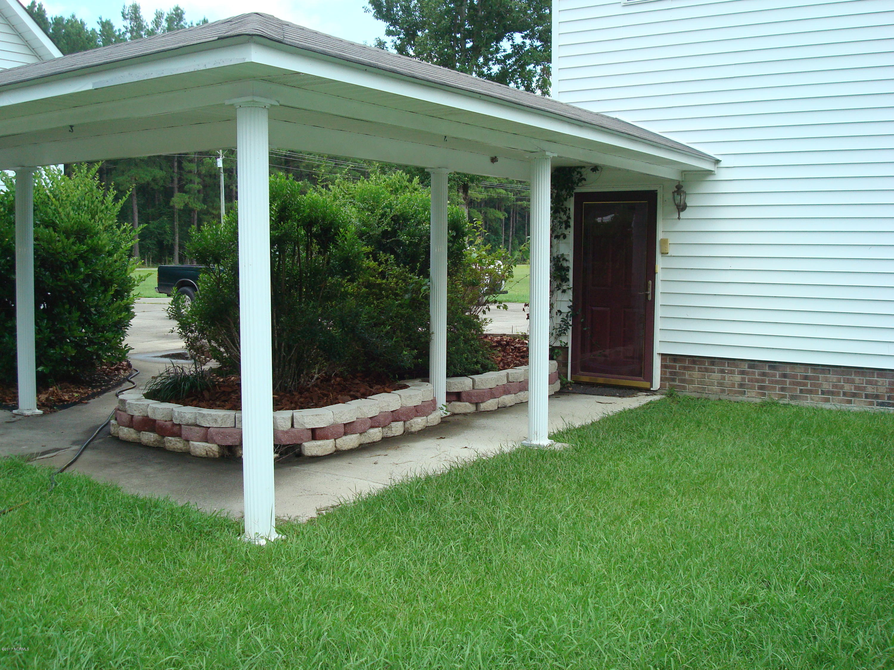209 Boyd Swamp Road Pinetown, NC 27865 - Photo 5 of 19 Entrance to Apt with portico attached to the Main House