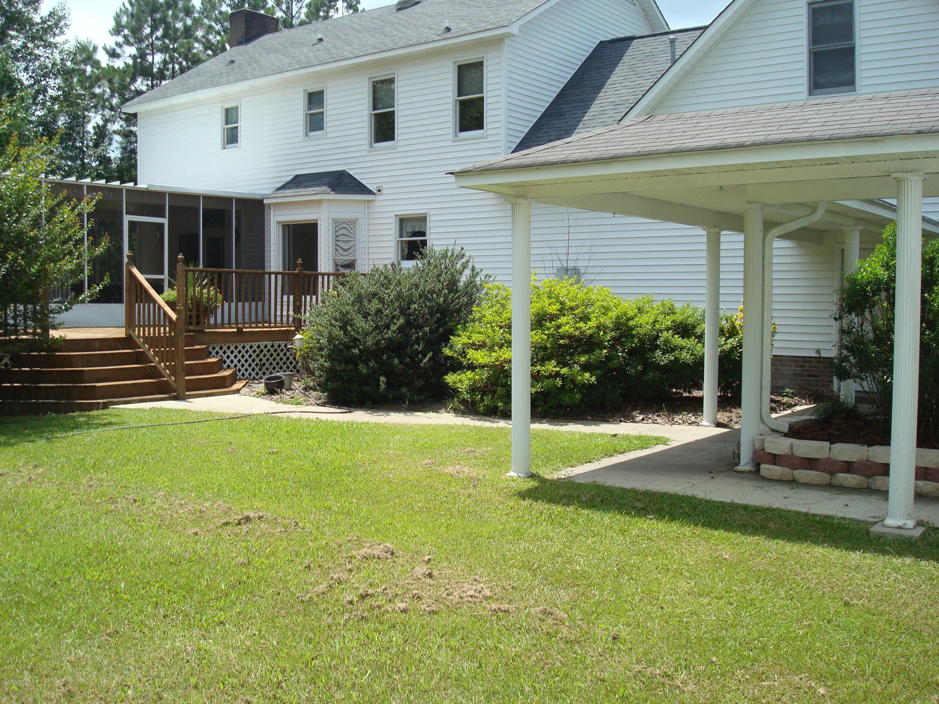 209 Boyd Swamp Road Pinetown, NC 27865 - Photo 6 of 19 Rear View of House with 28ft by 40ft deck