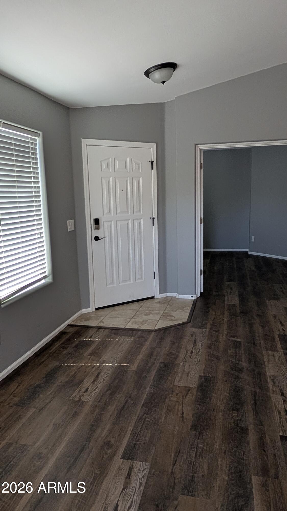 1377 East Pryor Road San Tan Valley, AZ 85140 - Photo 4 of 31 a view of an empty room with a window