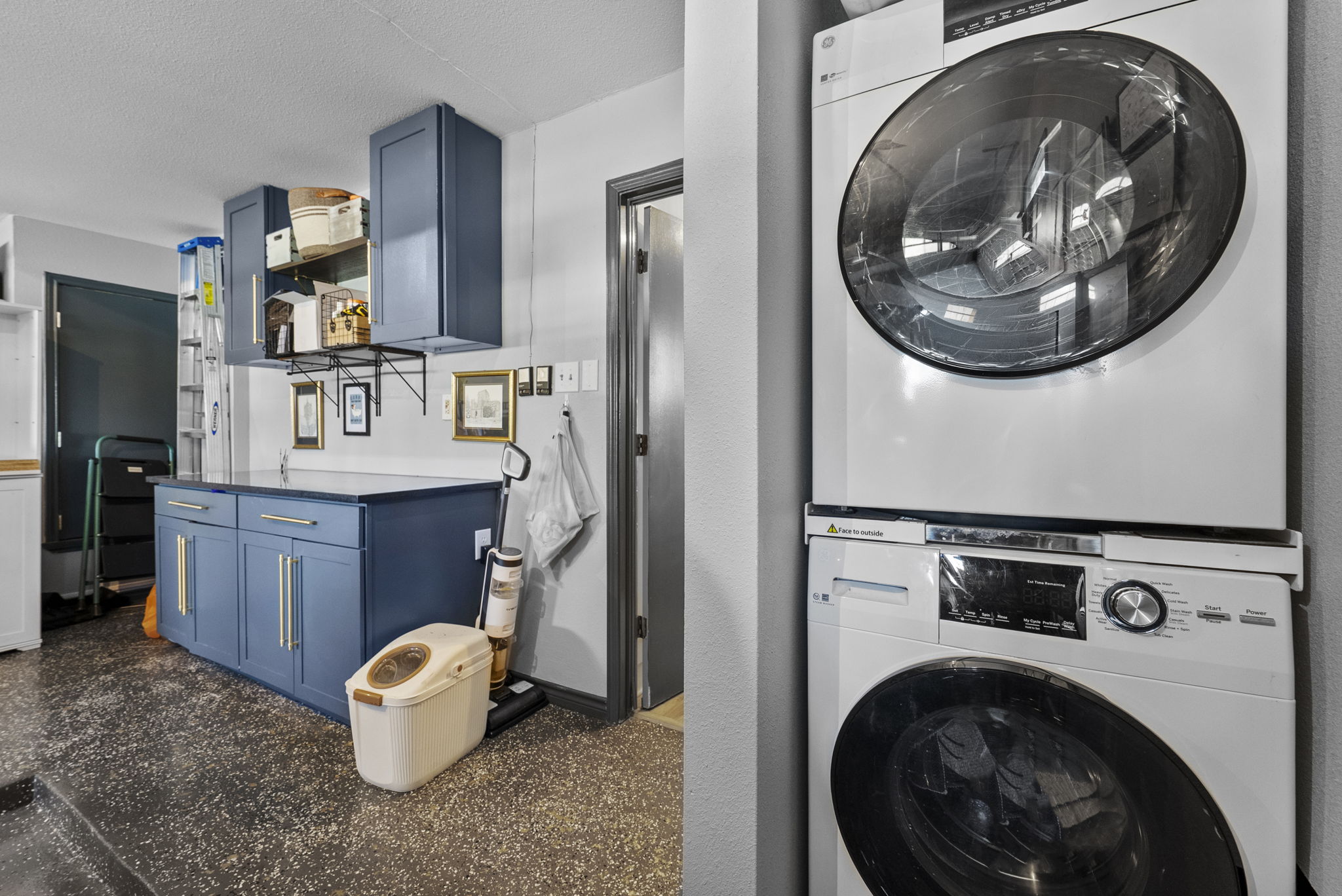 8102 Flashpan Cove Austin, TX 78729 - Photo 27 of 36 Epoxy flooring in the garage.
