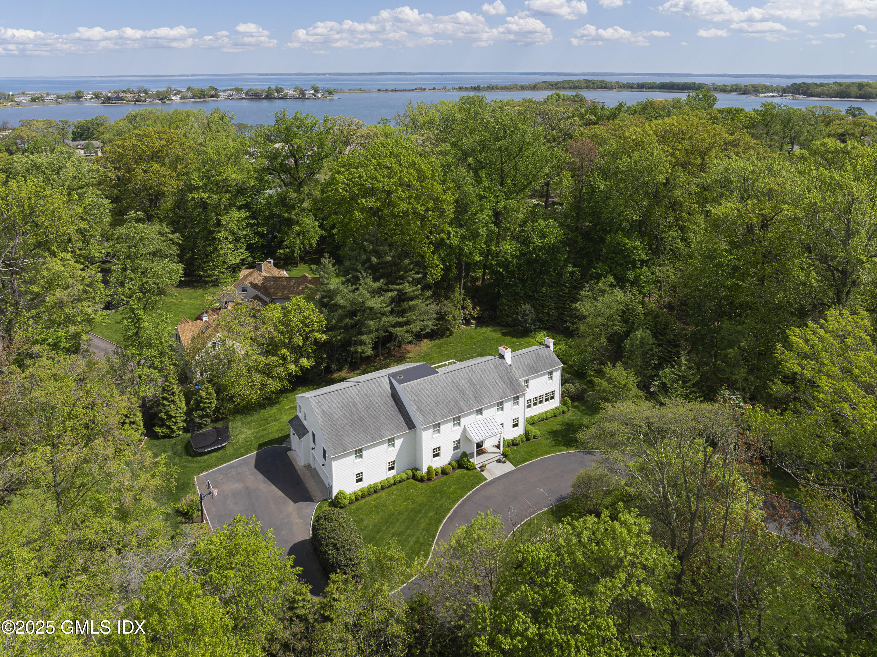 95 Indian Head Road Riverside, CT 06878 - Photo 10 of 10 an aerial view of a house with a garden