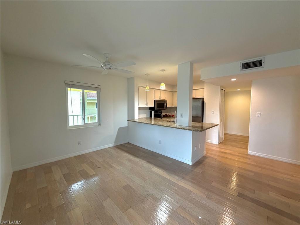 a view of kitchen and utility room
