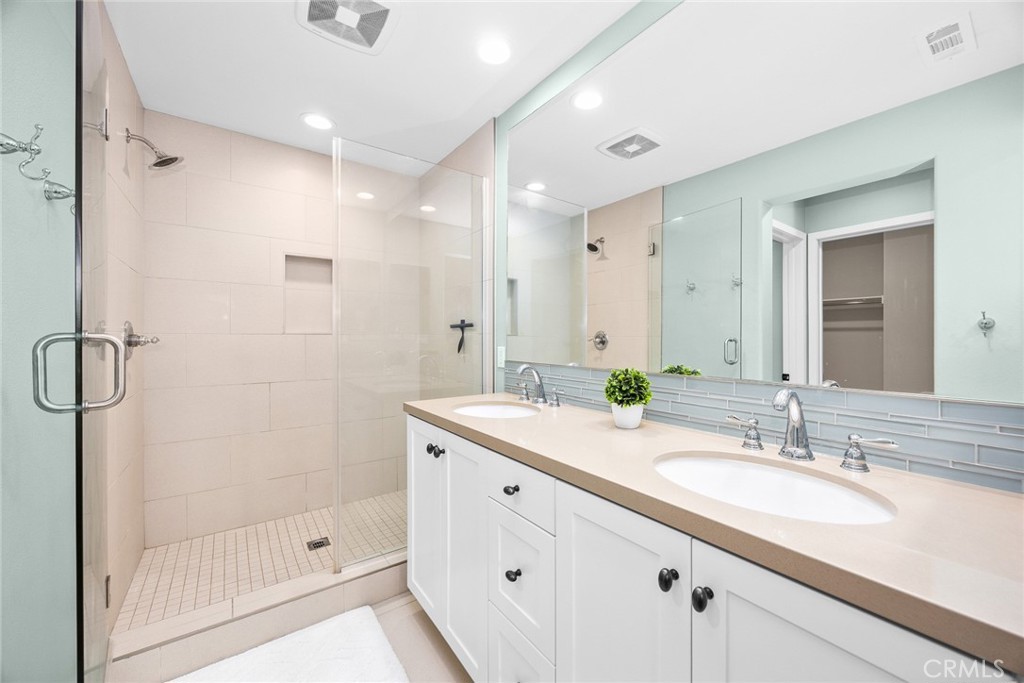 843 Orchid Way, Unit D Azusa, CA 91702 - Photo 20 of 38 a bathroom with a sink double vanity and shower