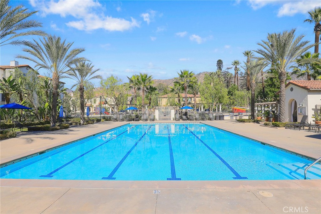 843 Orchid Way, Unit D Azusa, CA 91702 - Photo 32 of 38 a view of swimming pool with outdoor seating and city view
