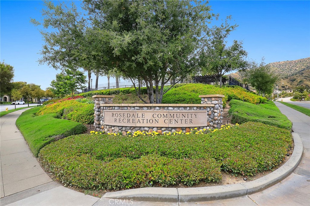 843 Orchid Way, Unit D Azusa, CA 91702 - Photo 35 of 38 a view of a sign on a park