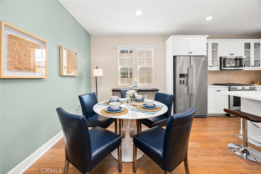843 Orchid Way, Unit D Azusa, CA 91702 - Photo 7 of 38 a view of a dining room with furniture and a table