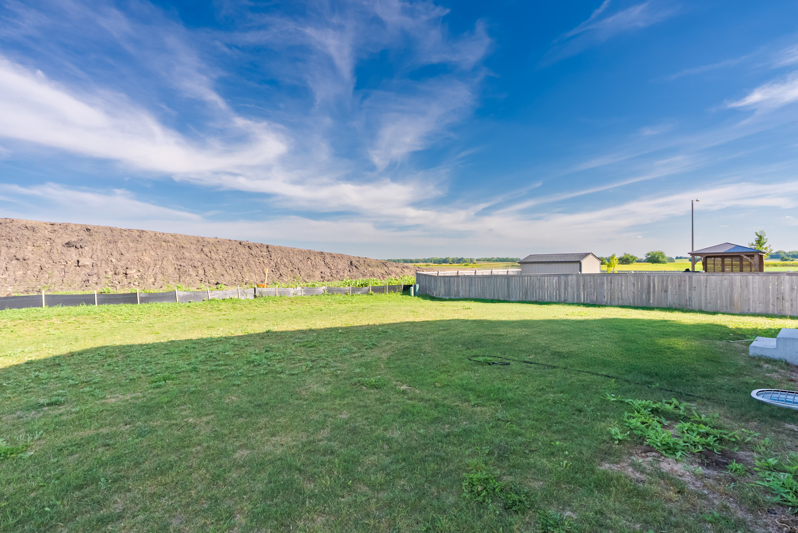 382 Hemlock Lane Oswego, IL 60543 - Photo 17 of 17 a view of building with outdoor space and seating area